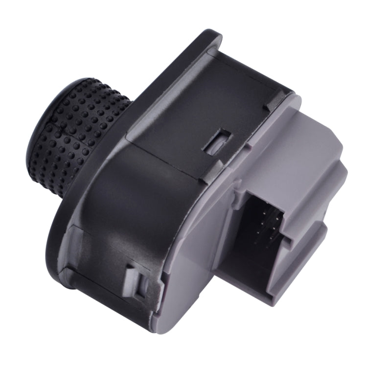 Rear mirror adjustment switch knob backside with mounting tabs and gray connector housing