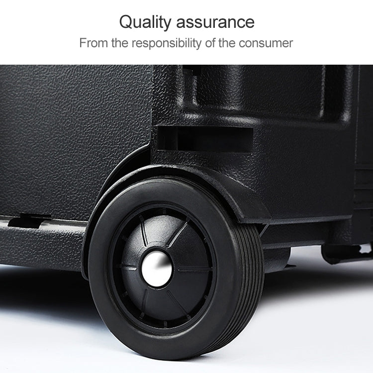 Close-up of a black caster wheel on a folding car storage box