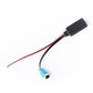 Bluetooth adapter cable end with blue connector and black module on red/black leads