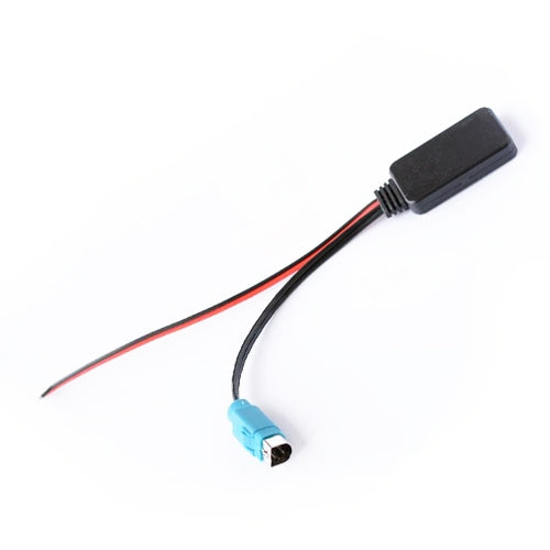 Bluetooth adapter cable end with blue connector and black module on red/black leads