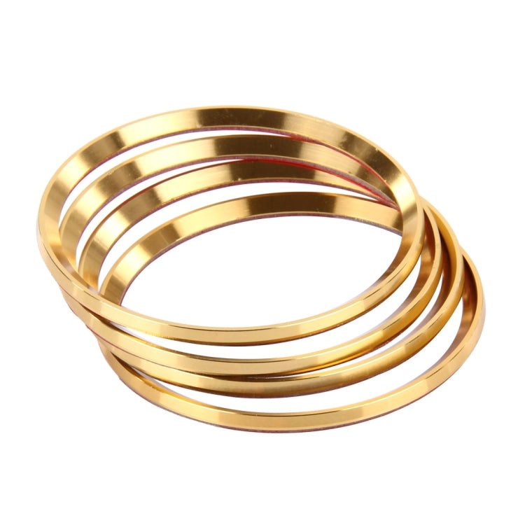 Set of gold wheel hub decoration rings with chrome inner trim