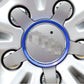 Blue wheel hub decoration ring with chrome inner trim on alloy wheel