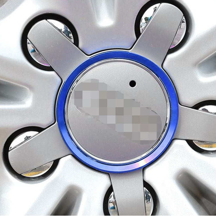 Blue wheel hub decoration ring with chrome inner trim on alloy wheel