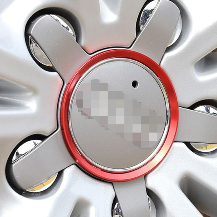 Red wheel hub decoration ring with chrome inner trim on alloy wheel