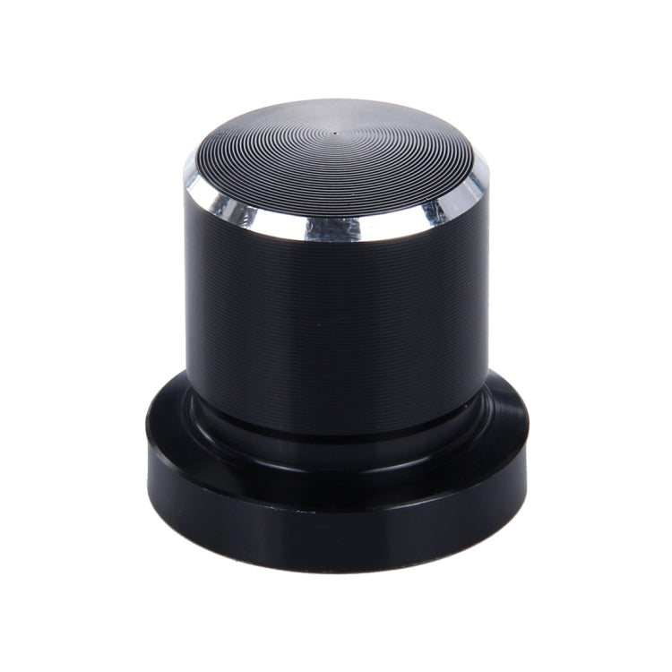 Black metal bump stop screw cap with ridged round top and silver trim ring