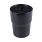 Auto car cylinder trash bin with star-shaped lid insert, dark plastic