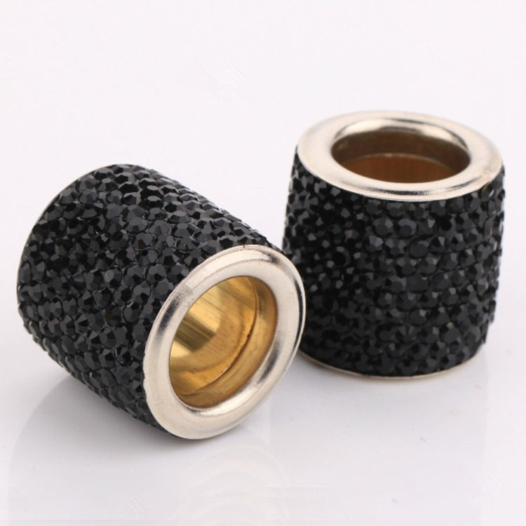 Set of black rhinestone crystal cylinders with gold inner rings and silver rims