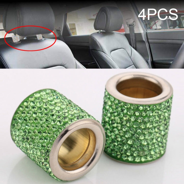 Set of green rhinestone crystal cylinders with gold inner rings and silver rims