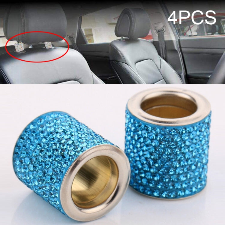Set of light blue rhinestone crystal cylinders with gold inner rings and silver rims