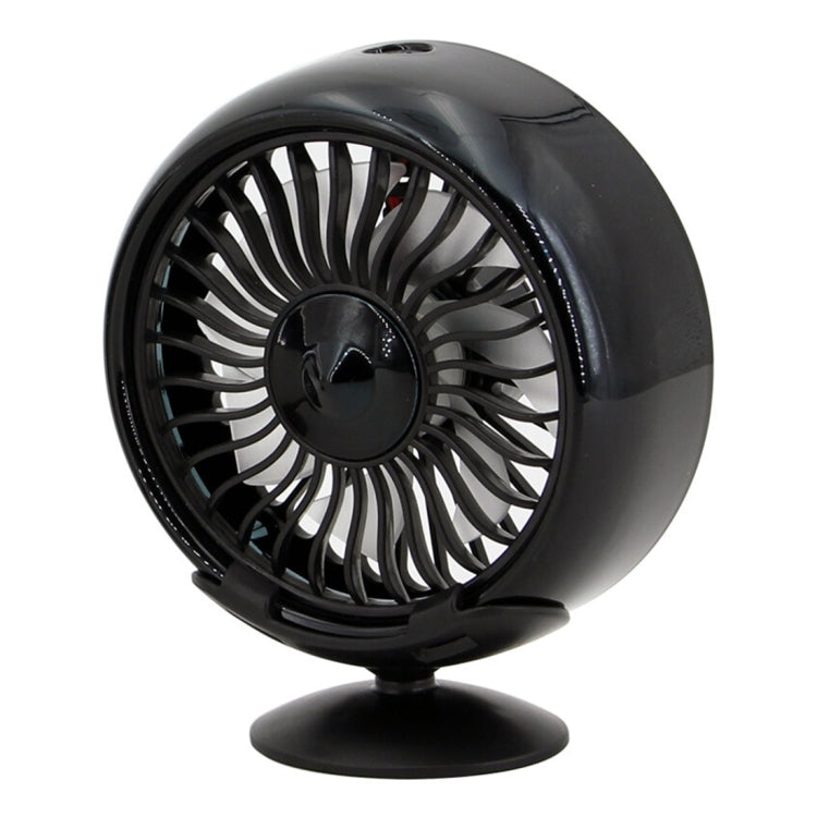 Black portable car electric cooling fan with base, angled view of circular grille and blades.
