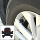 Black skull tire valve cap cover with red eye accents for valve stems