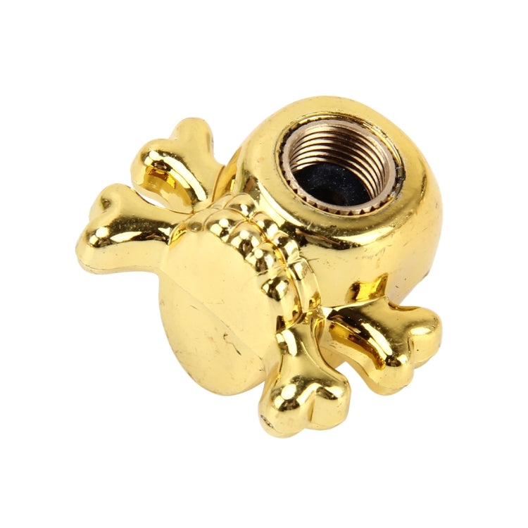 Gold skull tire valve cap cover with threaded valve stem opening