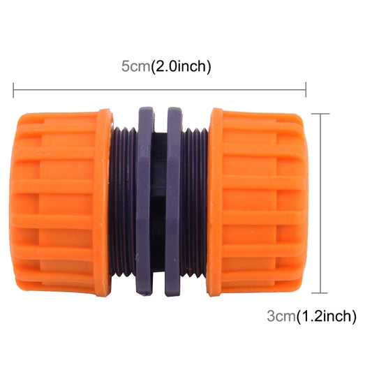 1/2 inch hose connector adaptor with ribbed orange ends and dark threaded center band