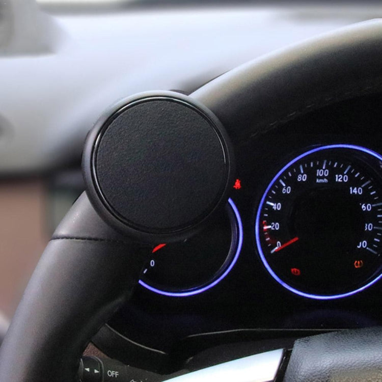 Black round steering wheel auxiliary booster with textured grip