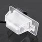 Car rear view backup camera with clear lens housing and side-mounted bracket