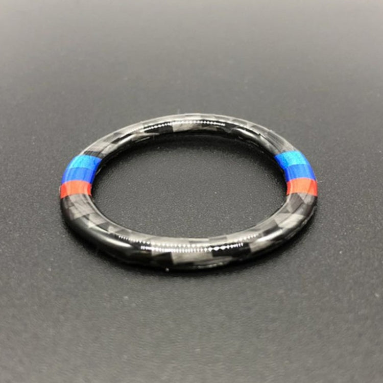 Carbon fiber style start button ring trim with red and blue accent stripes