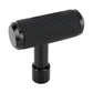 Black T-shaped gear shift knob with black perforated grip and dark metal base