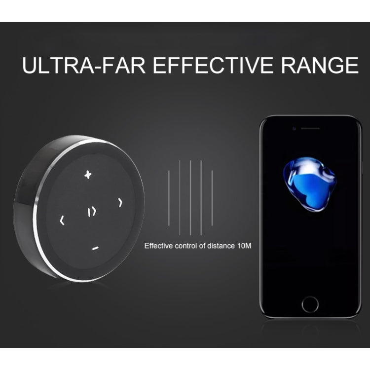 Black circular Bluetooth remote controller with illuminated plus and navigation symbols