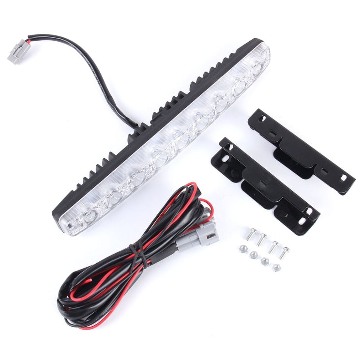 2-piece LED daytime running light kit with clear lens bar, wiring, brackets, and screws