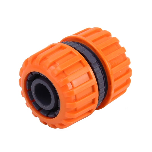Orange quick water hose connector adaptor for 3/4 inch pipes with ribbed grip