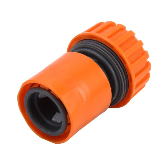 Orange and black 3/4 in hose quick-connect adapter, angled outlet view