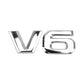 Silver V6 metal emblem sticker, close-up on plain background