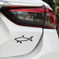 Shark silhouette car body metal sticker, black outline on rear panel