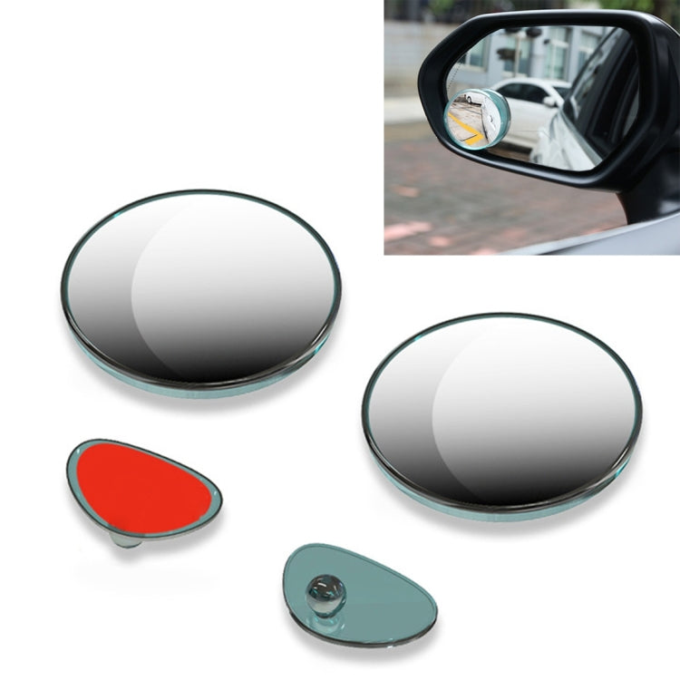 Pair of round blind spot mirrors with black reflective glass and green-tinted ring