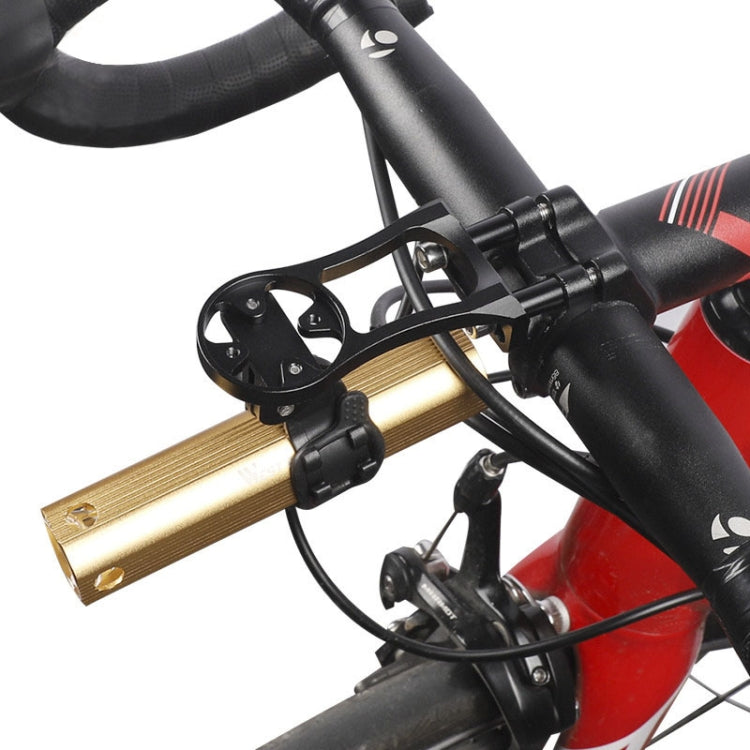 Black bike accessory mount with gold extension bar and handlebar clamp on bicycle