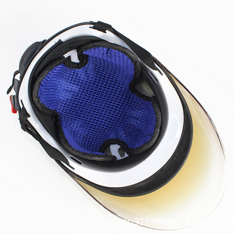 Blue honeycomb mesh helmet pad insert shown inside a motorcycle helmet