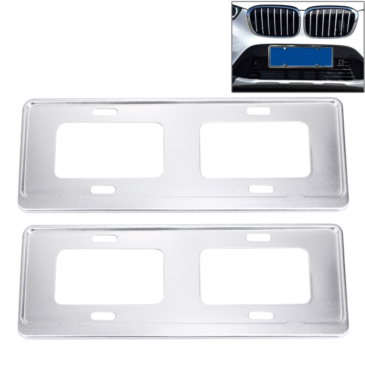Silver two-piece license plate frame holder brackets with rectangular cutouts