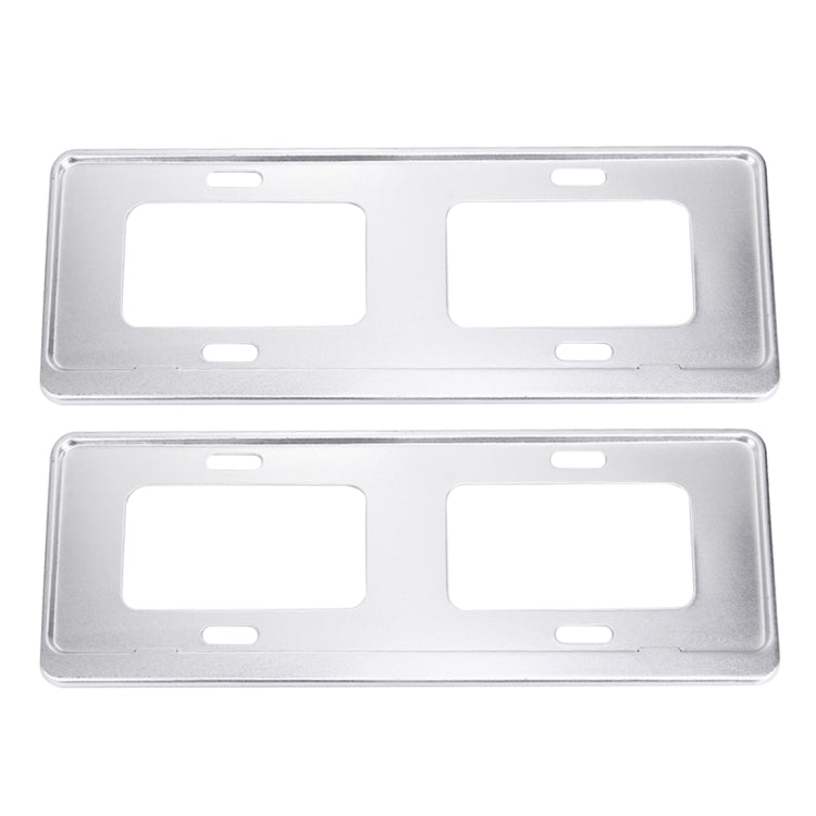 Silver two-piece license plate frame holder brackets, front view with cutout openings