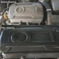 Car engine bay before-and-after cleaning with exposed engine cover areas