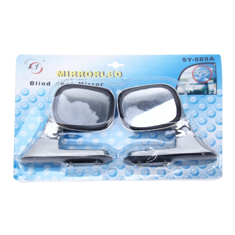 Blister package showing two chrome-and-black oval assistant mirrors