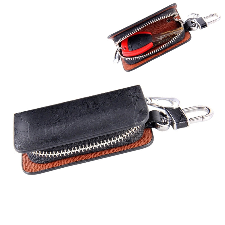 Black leather-texture zipper key wallet with red lining and metal key clip