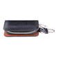 Black leather-texture zipper key wallet with metal key clip, closed front