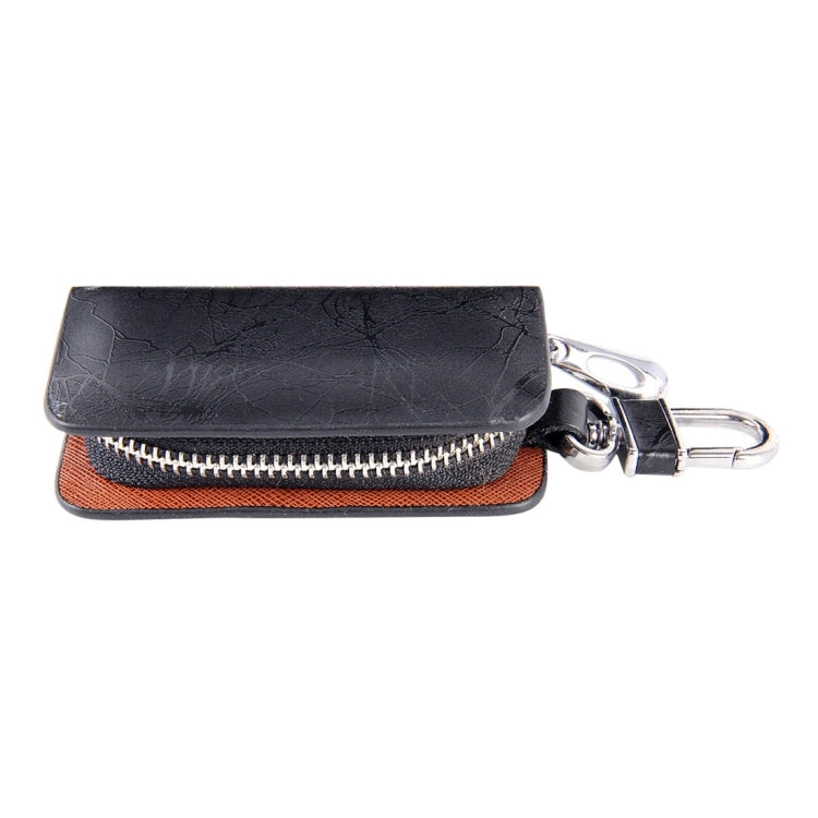 Black leather-texture zipper key wallet with metal key clip, closed front