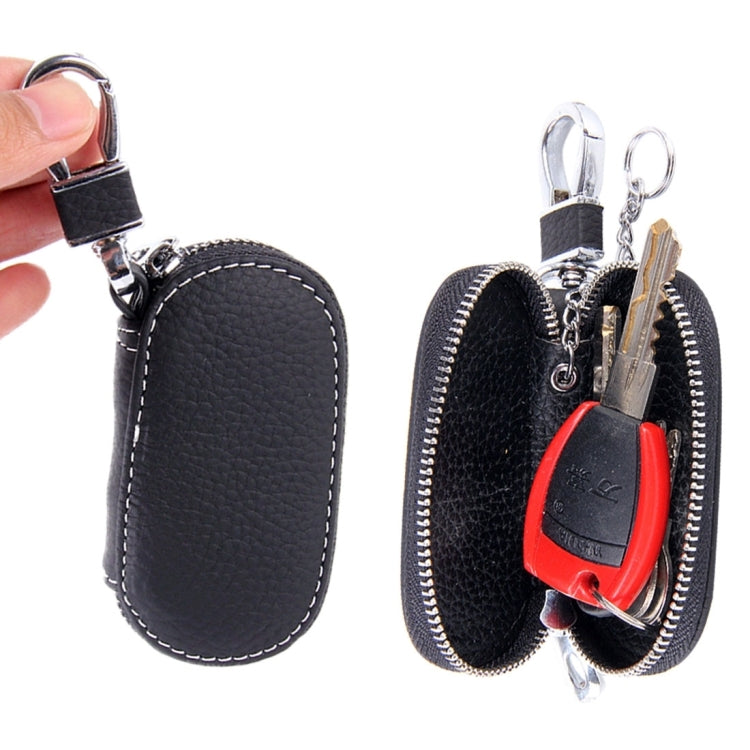 Black leather-look key holder wallets set with zipper closures and metal keyrings