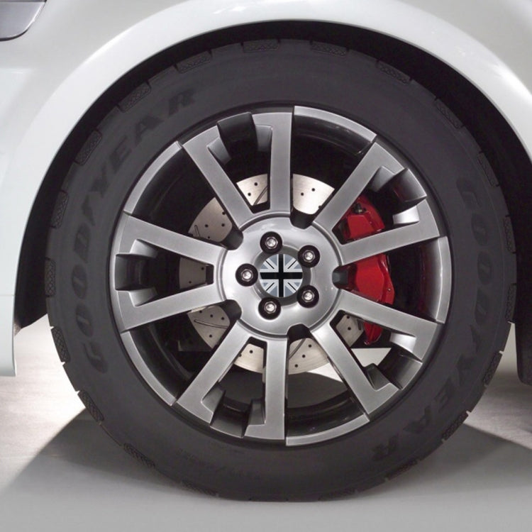 Set of 4 England flag wheel center covers shown on car wheel rim