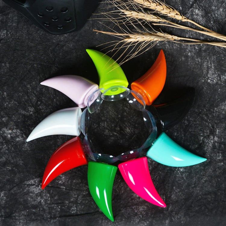 Multi-color devil horn suction decorations arranged for helmet mounting