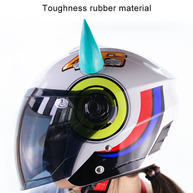 Teal devil horn suction decoration mounted on a full-face motorcycle helmet