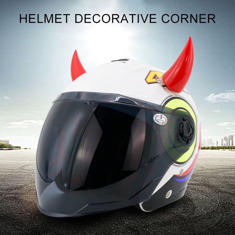 Red devil horn suction decorations on a white full-face motorcycle helmet
