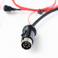8-pin connector end on car Bluetooth AUX adapter cable with black circular plug