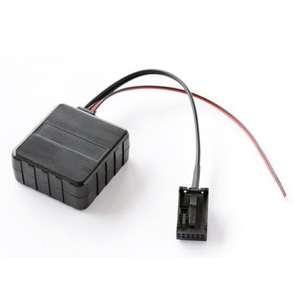 Rectangular black Bluetooth AUX audio adapter module with wire harness and connector ends