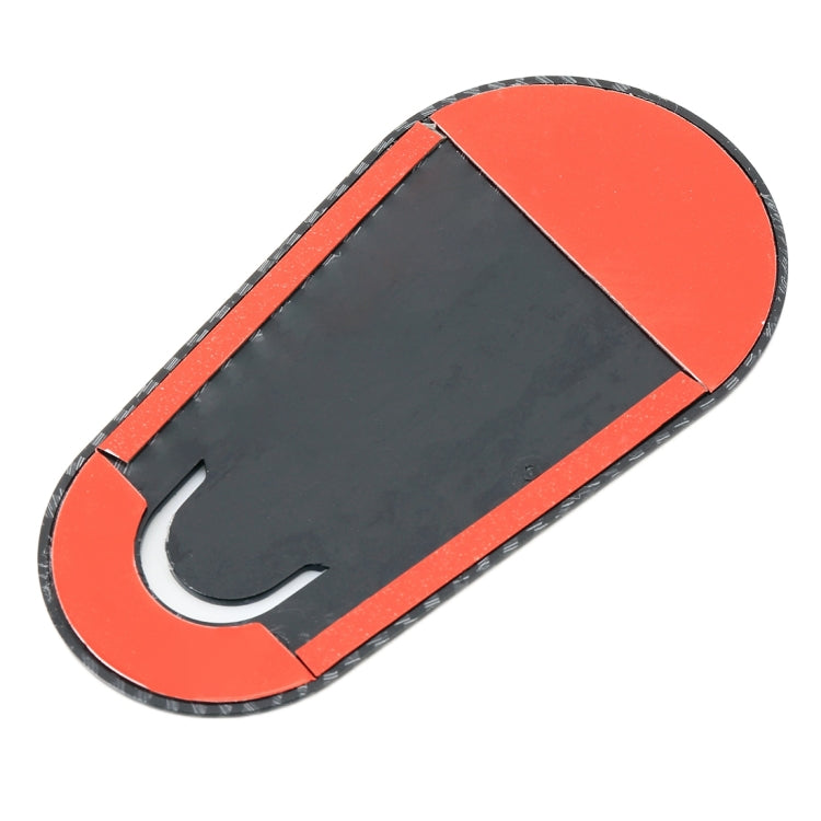 Oval car lock body decorative sticker with black panel and red/orange edge, glossy
