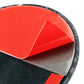 Close-up of car lock body sticker corner, red top with black bottom and gray border