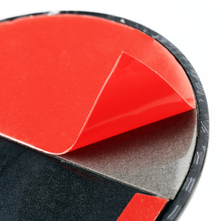 Close-up of car lock body sticker corner, red top with black bottom and gray border