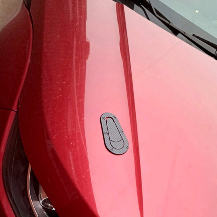 Car door panel with small oval lock body decorative sticker, gray carbon-fiber style