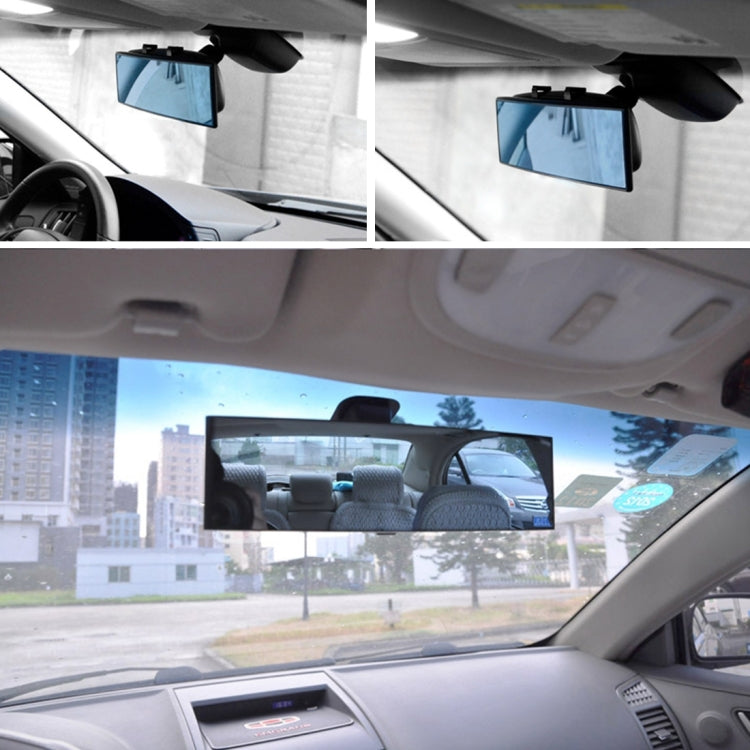 Installed interior rear view mirror showing a blue-tinted reflection in the car