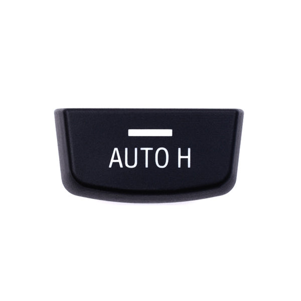 Black switch cover button with “AUTO H” text